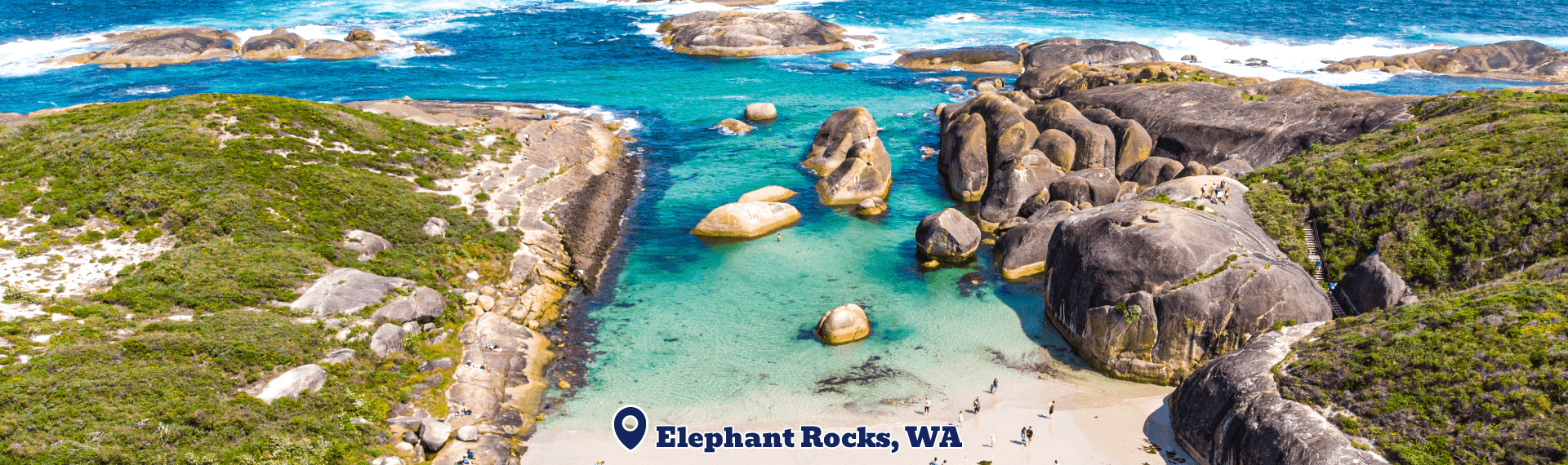 Scenic view of Elephant Rocks in Western Australia with clear blue water and greenery.