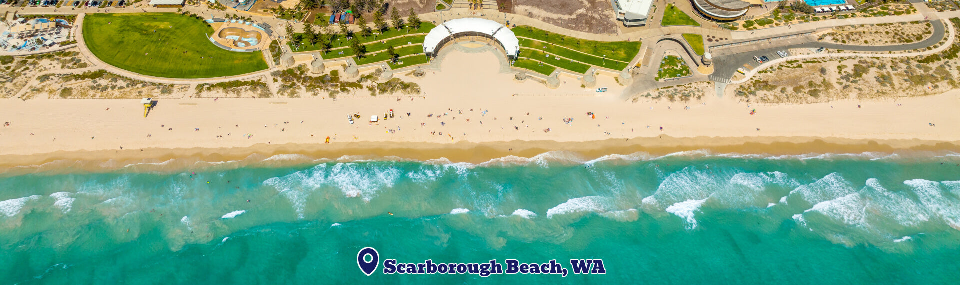 Aerial view of Scarborough Beach in WA with turquoise water and sandy shore.