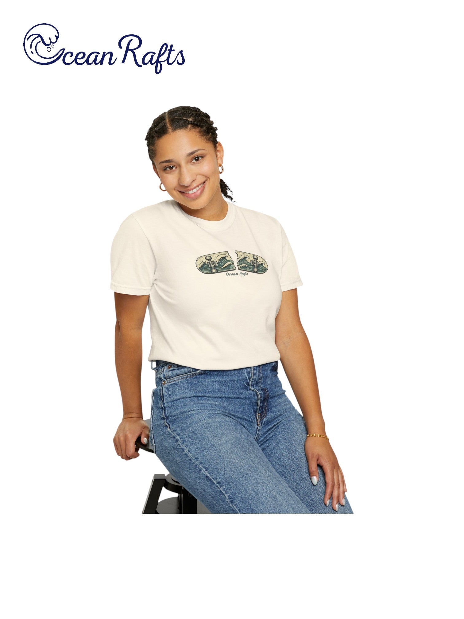 Tidal Break Shirt - Ocean Rafts - AU & NZ - women sitting down wearing beige Tee with broken skateboard with wave graphic
